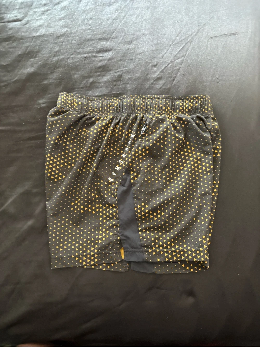Gymshark Men’s Black Shorts with Gold Triangle Print